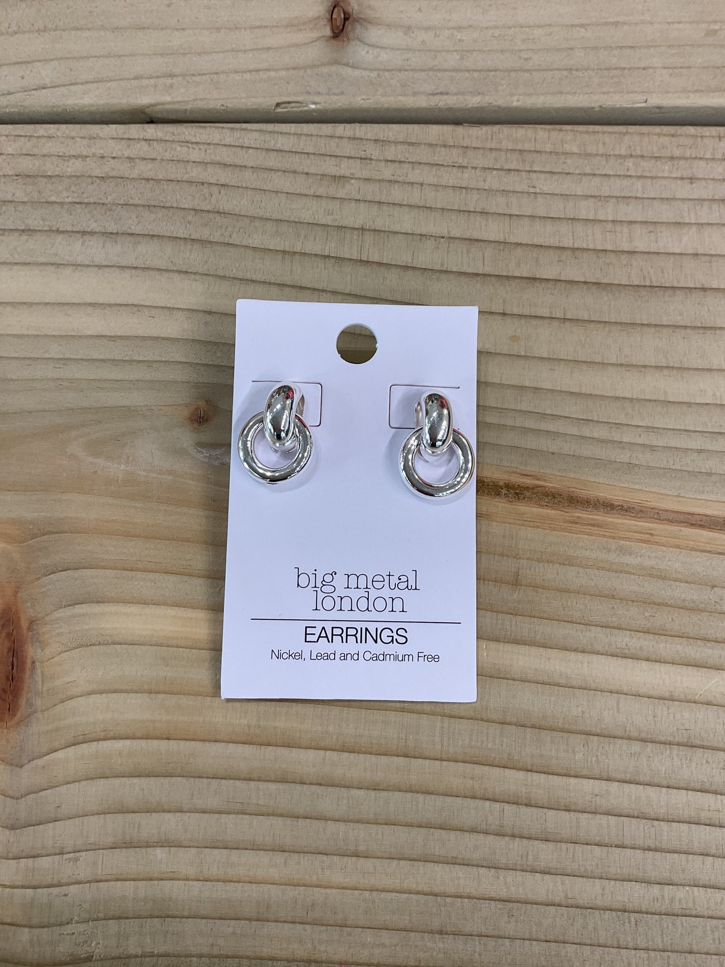 Silver interlocked hoop studs