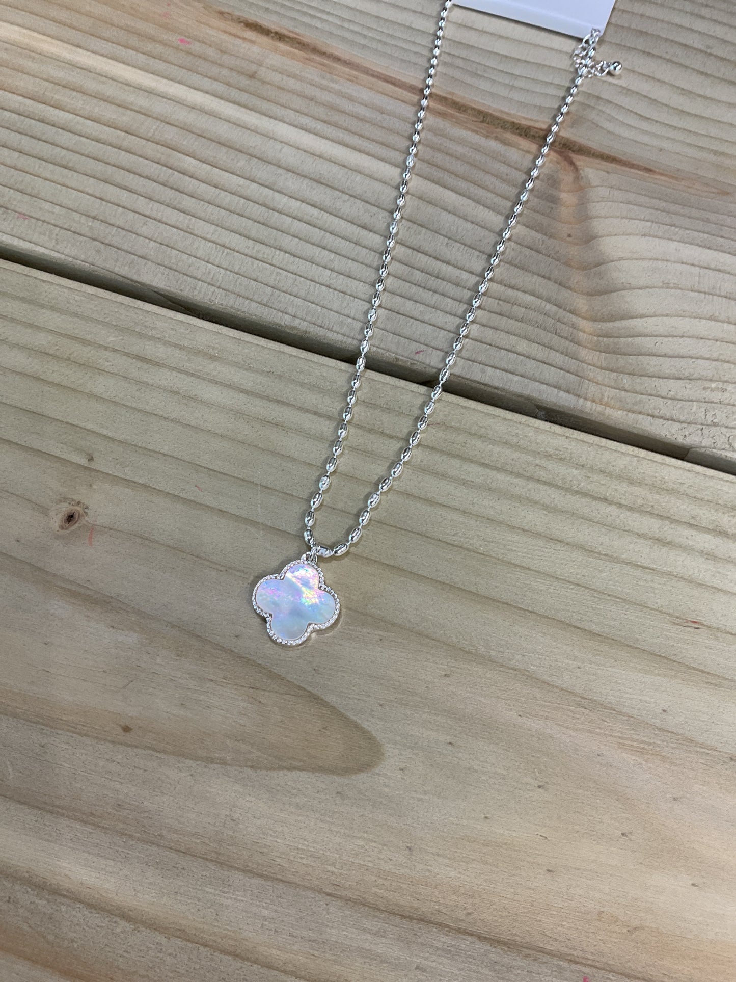 Four leaf iridescent silver necklace