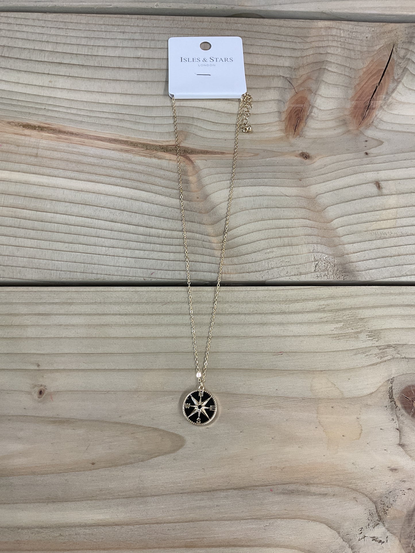 Compass gold and black necklace