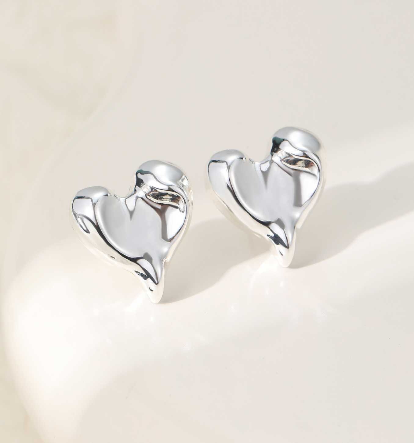 Uneven Heart Earrings - Silver